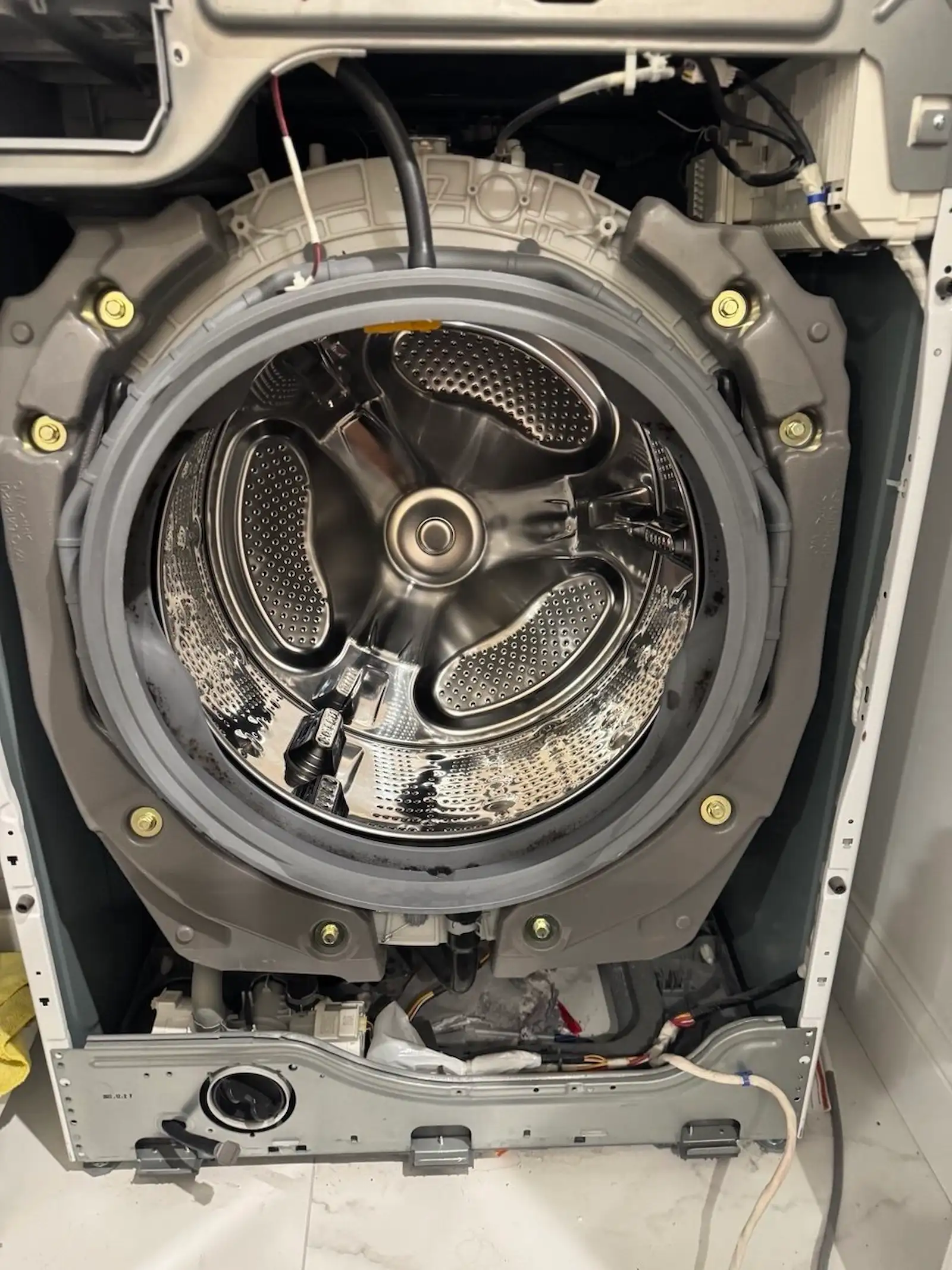 Front-load washer drum repair in a NYC home